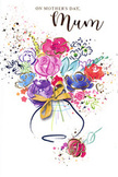 This Mother's Day card artwork shows a joyful, free-flowing bouquet painted in loose, expressive watercolour strokes, as though an artist paused on a walk through Tring, inspired by the colours of a spring garden. The flowers themselves are a mix of lush purples, playful pinks, and deep cerise tones, interspersed with calmer blues and soft lavender shades that lend a soothing balance, much like the peaceful paths around Tring Park. Some petals are edged in deep indigo, giving structure and depth to the blooms, while whispers of leafy green peek through in deft strokes that suggest fresh foliage supporting the display. Fine trails of gold brush lightly along certain petals, leaves, and accents, catching the light with a subtle shimmer and echoing the way late-afternoon sun kisses the rooftops along Tring's High Street. The bouquet is gathered into a simple vase rendered in sheer washes of colour, its curved shape finished with a delicate golden bow that brings to mind the quiet rustle of ribbon as a florist completes a gift for a much-loved mum. Around the central arrangement, small specks and splashes of pigment drift outward like petals scattered in celebration, alongside tiny heart shapes that underline the affectionate message of the card. The entire composition feels airy yet heartfelt, a painted hug that speaks of gratitude, tenderness, and long-nurtured bonds, perfect for a Mother's Day greeting that will sit proudly on a Tring windowsill or mantelpiece, radiating warmth each time it is seen.
