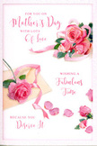 A romantic Mother's Day card is shown in close detail, its artwork resembling a soft floral still life laid out on a table in a cosy Tring home. Across a pale, airy background, clusters of blush and mid-pink roses unfold in full, rounded blooms. Their petals are layered and gently ruffled, with tiny highlights and shadows that create the illusion of velvety texture under a gentle light. Some roses appear in a main group, like a loose, hand-gathered bouquet, while others drift away in smaller clusters and single, scattered petals, as if a breeze from Tring Park had passed over the design. The petals are arranged with just enough irregularity to feel natural and unforced, evoking the relaxed elegance of a bouquet styled by an experienced florist. Intertwined with the roses, graceful calligraphic text delivers a warm Mother's Day message. The lettering flows in soft curves and loops, echoing the shapes of the petals and giving the impression that the words themselves are part of the floral pattern. The overall colour scheme stays within a gentle, feminine spectrum: whites, creams, blush pinks, and slightly deeper rose tones. The lighting is calm and even, wrapping the entire card in a comforting glow, like the soft afternoon light that falls over Tring's High Street on a quiet day. Nothing feels harsh or overly bright; instead, the scene conveys tenderness, gratitude, and calm celebration. This card design feels perfectly matched to a fresh bouquet of pink roses, the sort that might be ordered for same-day Mother's Day delivery to homes and cottages throughout Tring.